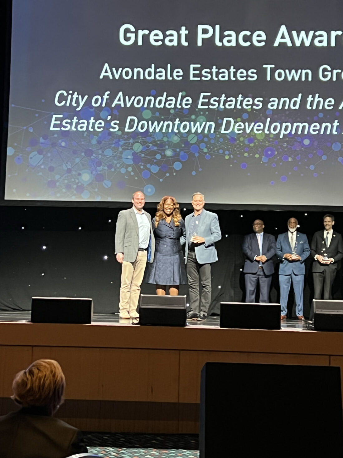 City Manager Patrick Bryant and Mayor Jonathan Elmore accept the Award of Regional Excellence for Great Places at the Atlanta Regional Commissions State of the Regionl